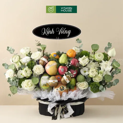 giỏ trái cây kính viếng đen trắng, hoa tươi và trái cây nhập khẩu